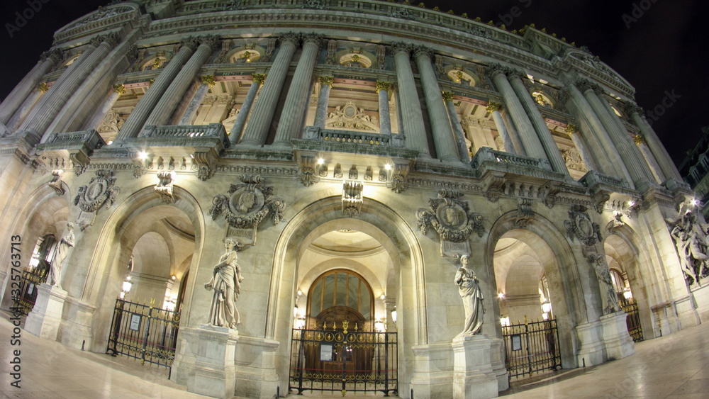 Fototapeta premium Opera National de Paris in the nighttime. Grand Opera Paris, France timelapse