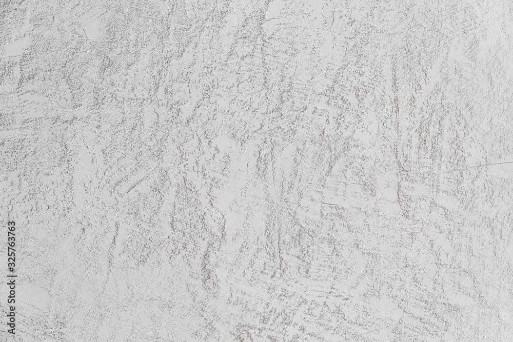 Naklejka premium exture of concrete and plaster on the wall. Lines in the plaster. Texture of decorative plaster or stucco close up, abstract gray background.