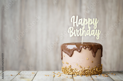 Chocolate birthday cake with banner photo