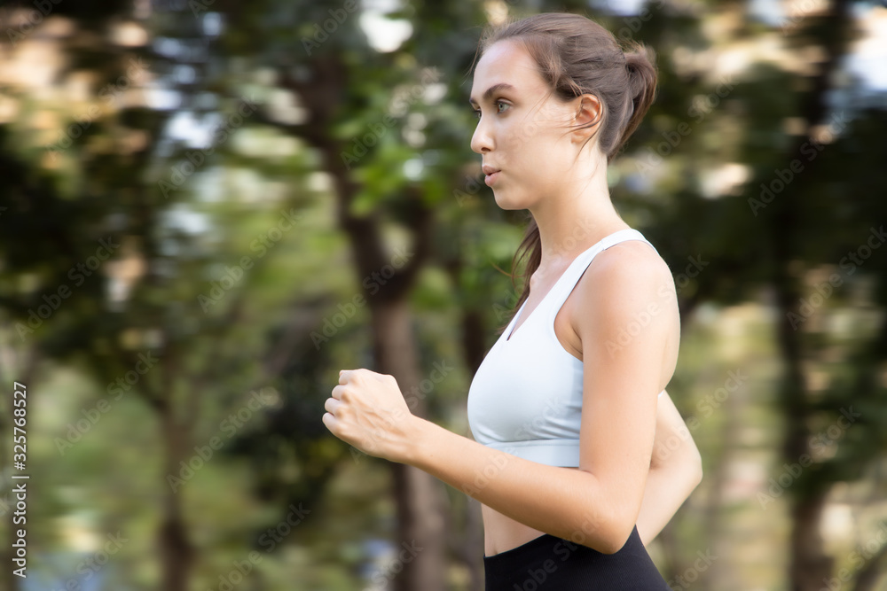 healthy happy strong fitness woman running; woman with healthy lifestyle, health care, woman running or jogging, marathon run, sprinting, confident fitness people concept; white caucasian woman model healthy happy strong fitness woman running; woman with healthy lifestyle, health care, woman running or jogging, marathon run, sprinting, confident fitness people concept; white caucasian woman model