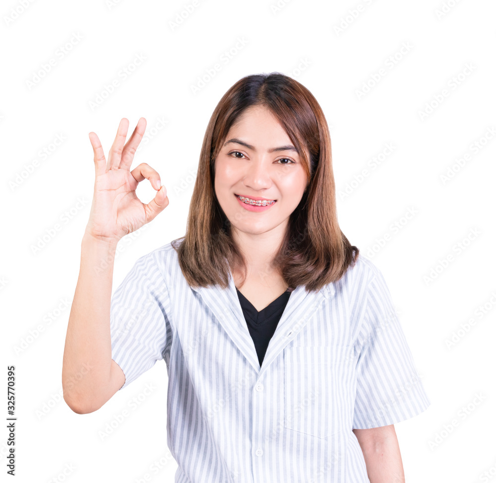 woman showing OK hand sign on white background woman showing OK hand sign on white background