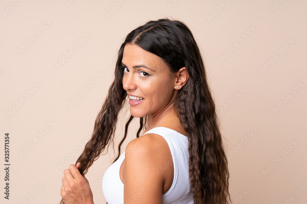 Obraz premium Portrait of young woman over isolated background