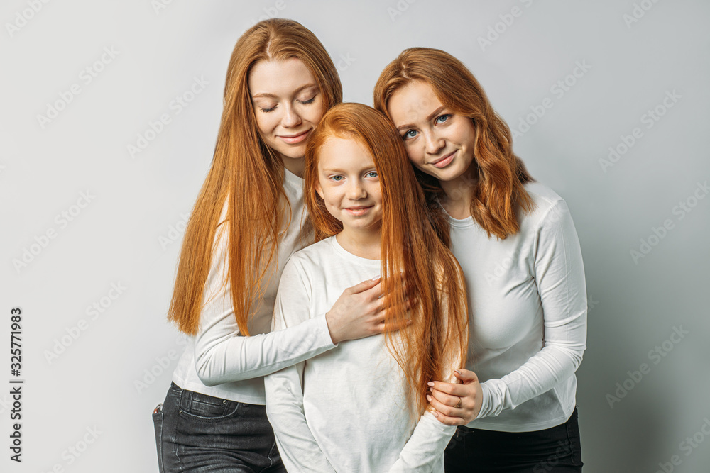 people diversity, natural beauty concept. redhead people, relatives in white clothes isolated in studio. people, diversity, fashion, naturalness people diversity, natural beauty concept. redhead people, relatives in white clothes isolated in studio. people, diversity, fashion, naturalness