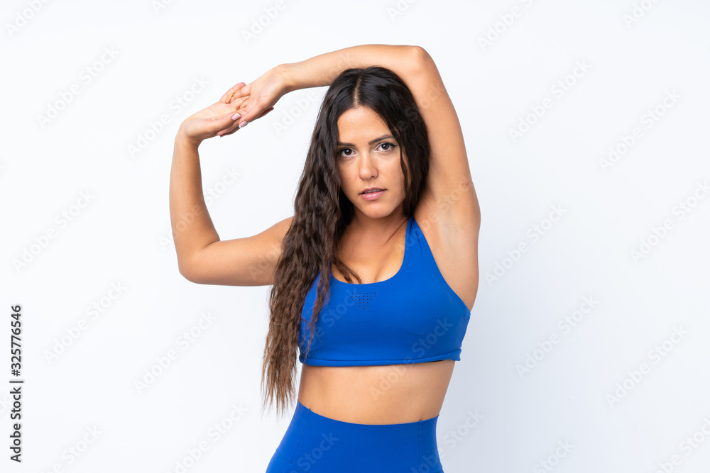 Young sport woman over isolated white background stretching Young sport woman over isolated white background stretching