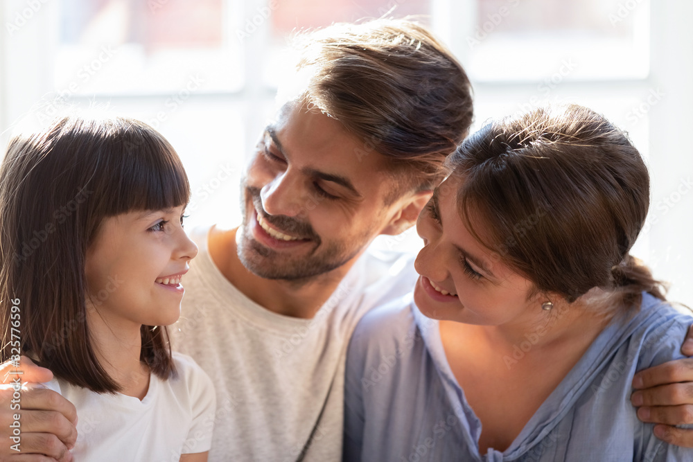 Happy family with little daughter hug enjoy time together Happy family with little daughter hug enjoy time together