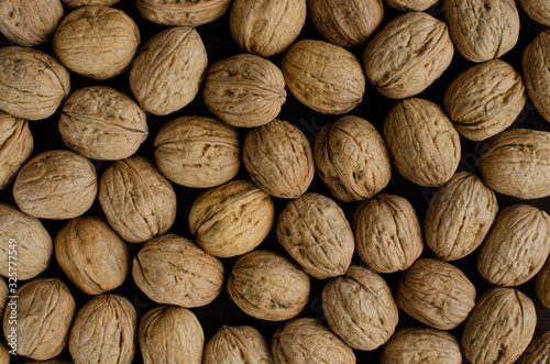 Walnut background. Walnut with shell.