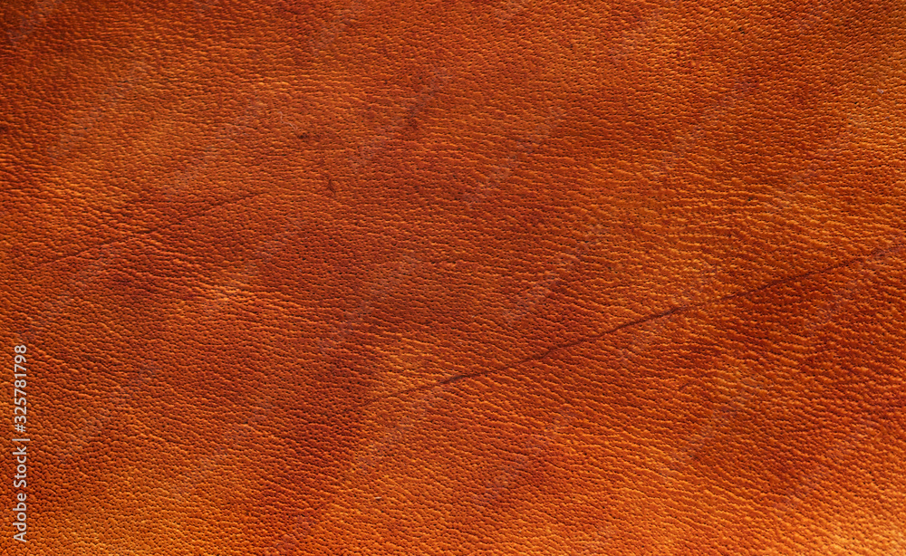 custom made wallpaper toronto digitalOrange nut brown vegetable tanned leather closeup full frame macro texture showing top grain and wear scratch marks