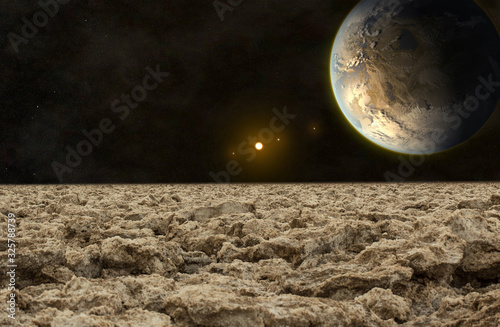 exoplanet viewed from the rocky surface of its moon, elements of this image furnished by NASA. photo