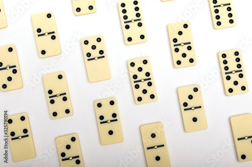 Photo of different dominoes. Background of dominoes. Hobbies collecting on white background.