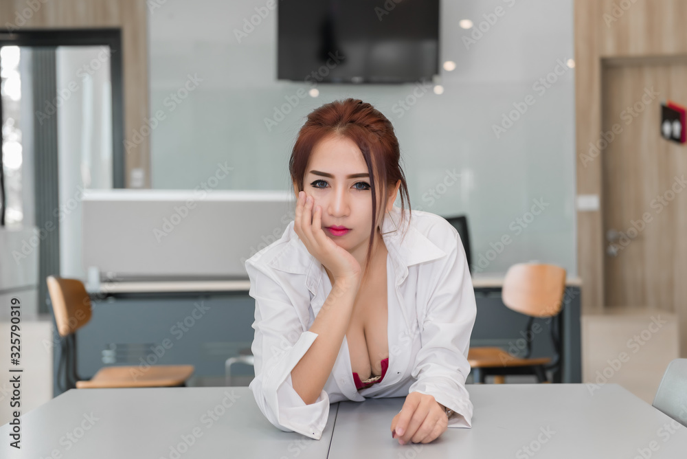 Portrait of asian sexy woman in the office,thailand people Portrait of asian sexy woman in the office,thailand people