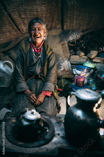 Nomadic old Woman. They live for several months a year in tents, looking for fresh pastures for their goats, from which comes cashmere wool. In Ladakh, Kashmir, India.