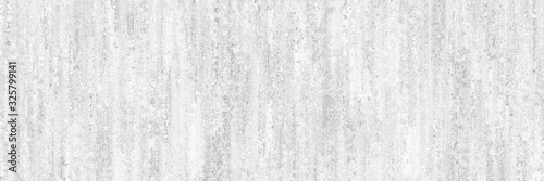 Concrete background.White painted wall with gray and dirty texture.Long light wall. © Milovan