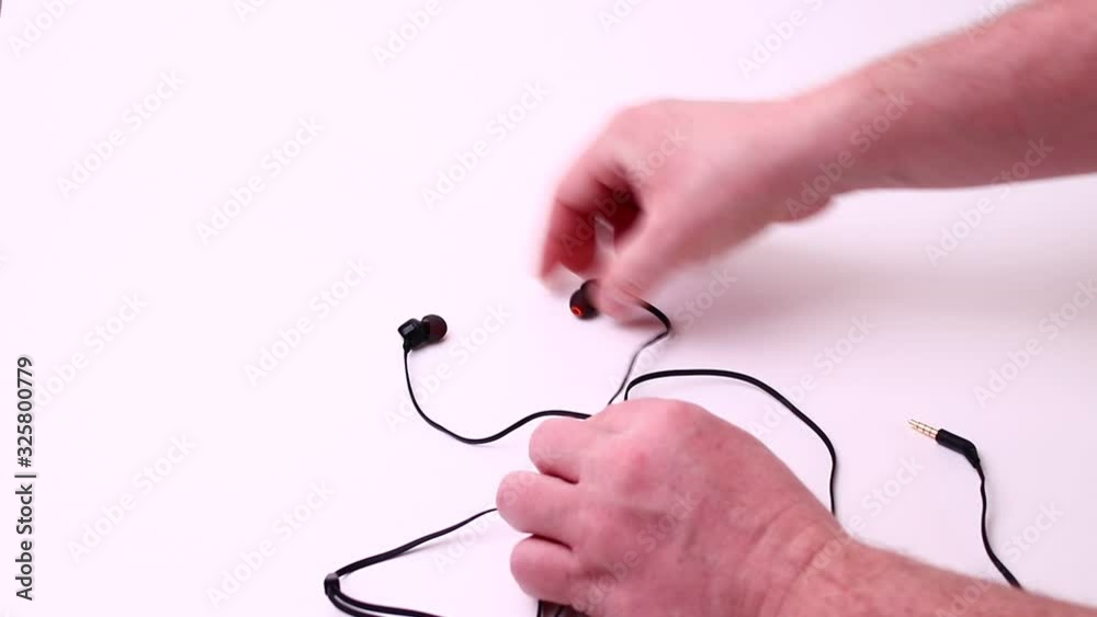 Black headphones isolated on a white background. Black headphones isolated on a white background.