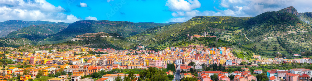 Wonderful morning panorama of colourful houses of old town Bosa in Sardinia