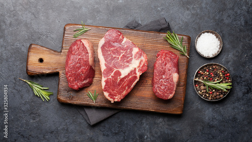 Variety of raw beef steaks