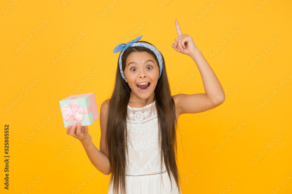 Finally got it. Accessories and cosmetics. Summer season. Buy gift. Online shopping. Perfect gift concept. Cute small kid adorable dress. Girl long hair hold gift box. Present for teen girl Finally got it. Accessories and cosmetics. Summer season. Buy gift. Online shopping. Perfect gift concept. Cute small kid adorable dress. Girl long hair hold gift box. Present for teen girl