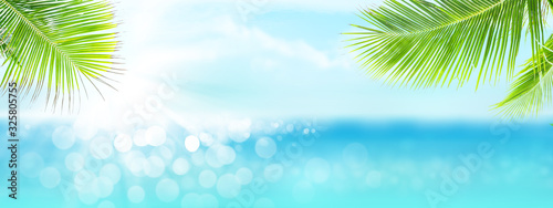 Summer tropical sea with sparkling waves and blue sunny sky
