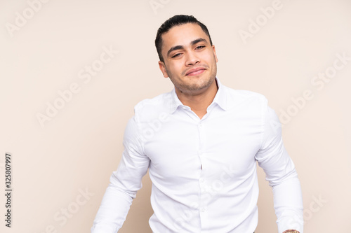 Asian handsome man isolated on background © luismolinero