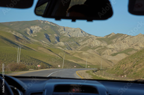 Xizi , Azerbaijan. Colorful hills . striped hills .Steppe high mountains like marsian peisage . view of the desert from inside the car. View of the beautiful striped no tree .mountain .