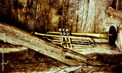 Photography an old jazz trumpet in an old house