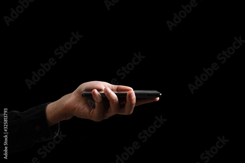 Close up of a man using mobile smart phone