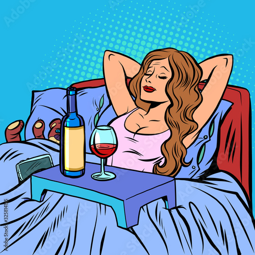 a woman drinks wine alone