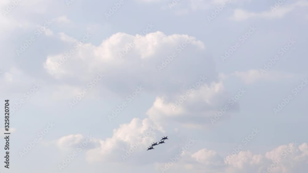 A jet fighter makes a figure A jet fighter makes a figure