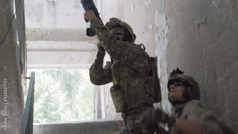 a group of soldiers throws a grenade. airsoft. 4k a group of soldiers throws a grenade. airsoft. 4k