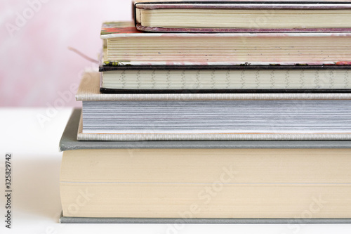 Stack of books tied with a bow