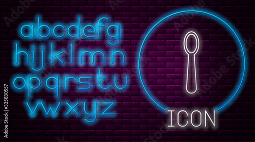 Glowing neon line Disposable plastic spoon icon isolated on brick wall background. Neon light alphabet. Vector Illustration