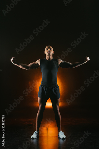 Professional sports champion tensing muscles stock photo © shevchukandrey