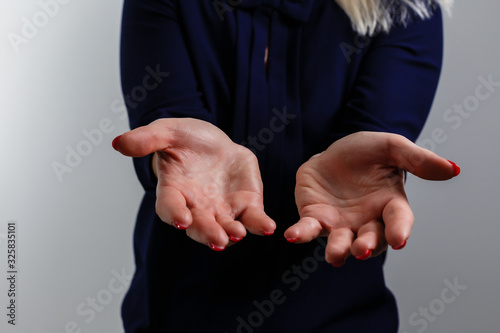 Closeup portrait of a young woman praying