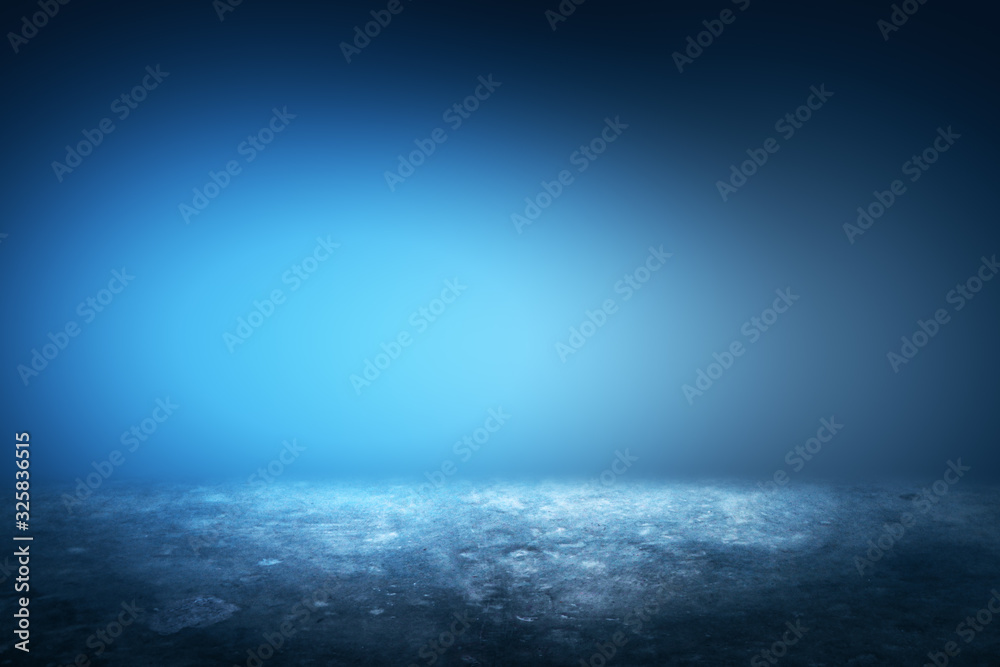 Obraz premium Empty illuminated blue background.