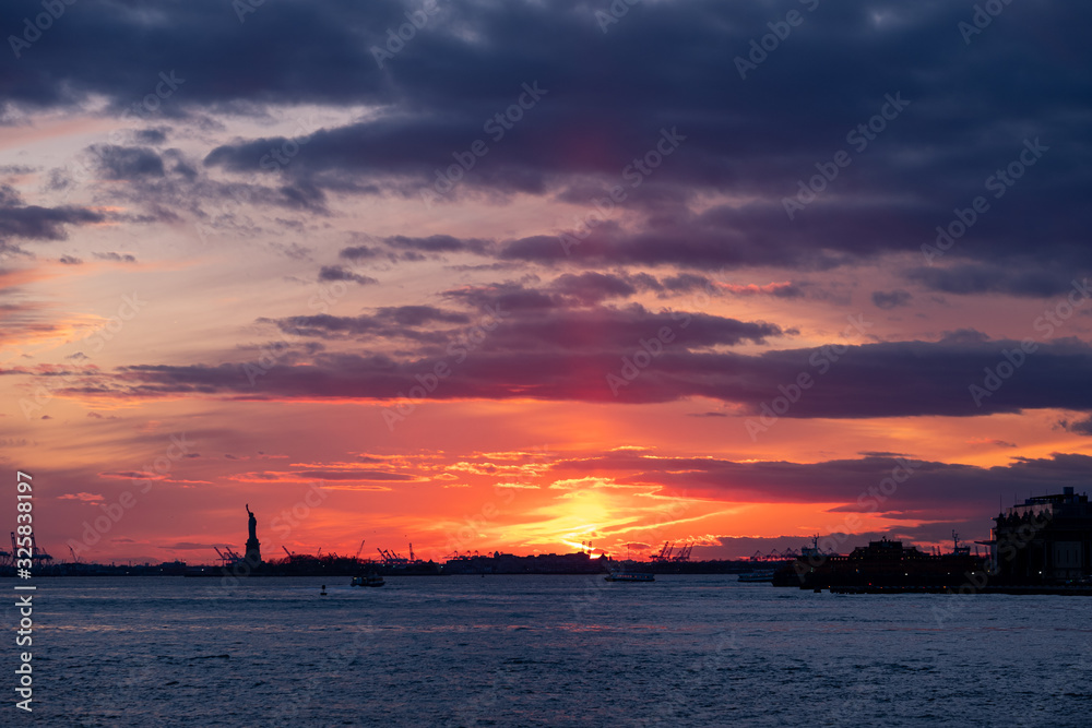Winter Sunset view of Statue of Liberty and Upper New York Bay