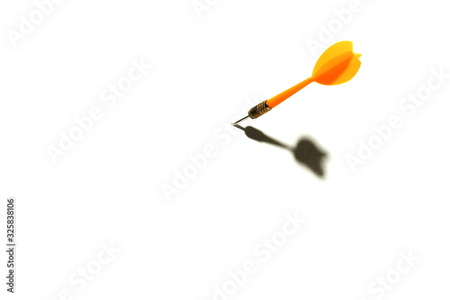 yellow dart with shadow on a white background