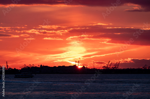 Winter Sunset view of Statue of Liberty and Upper New York Bay