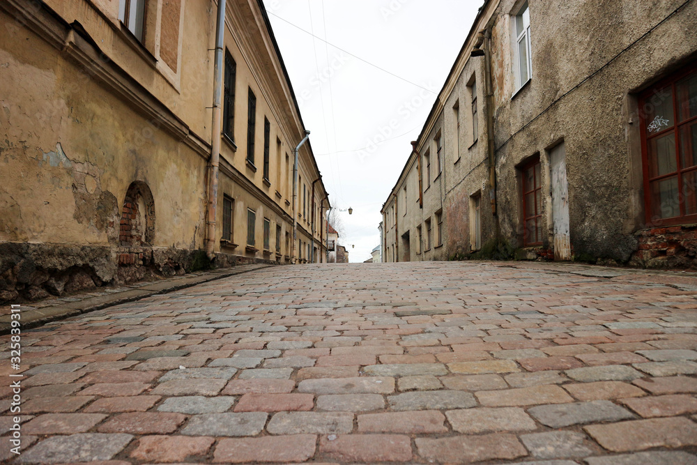 street with stone pavement in old town of vyborg, Russia
