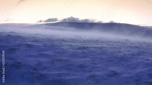 Aerial Flight Over Snow Blowing In Mountain Winter Hills Golden Hour Colors Beautiful Colors Sky Sky Resort Vacation Cinematic Flight 4k photo