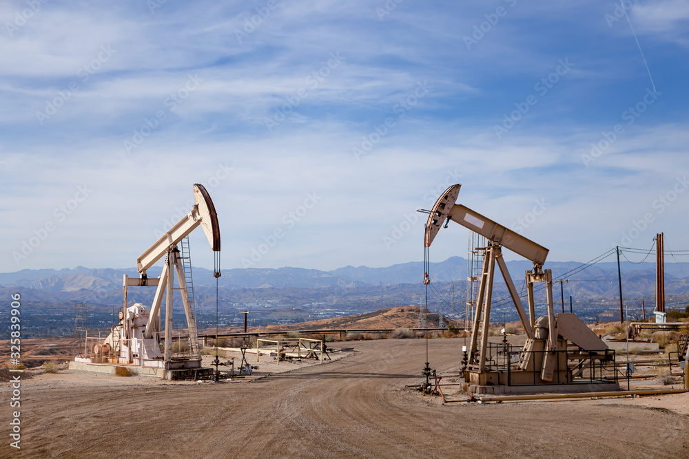 Oil Rig Pump-jack Working Natural Resource Energy Production North America Oil Rig Pump-jack Working Natural Resource Energy Production North America