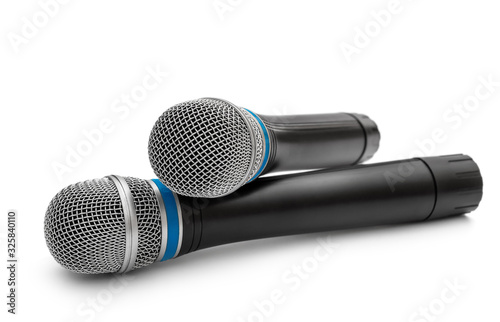 Two microphones on a white background.