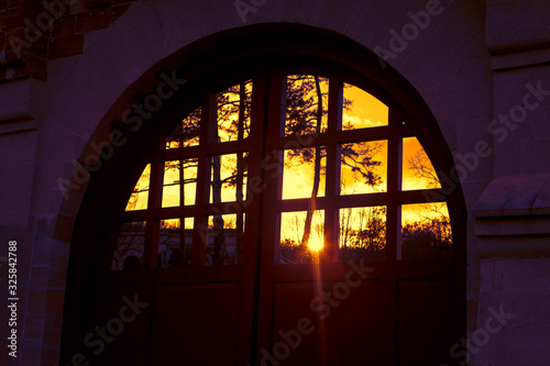 sunset reflection in the medieval gate 