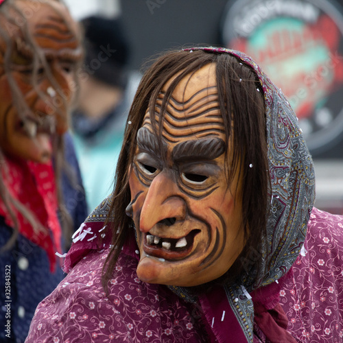 Closeup Portrait of a masked person on a carnival parade