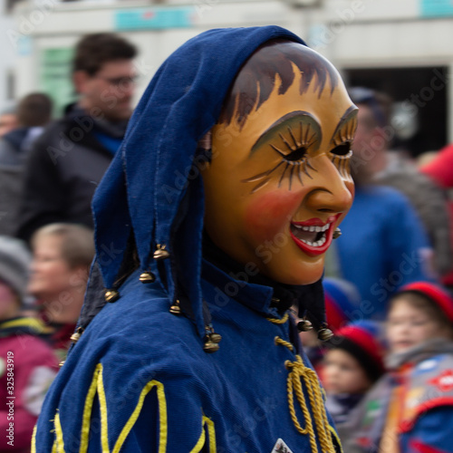 Closeup Portrait of a masked person on a carnival parade