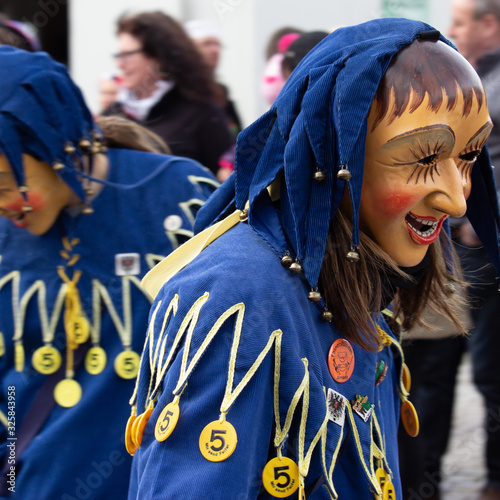 Closeup Portrait of a masked person on a carnival parade