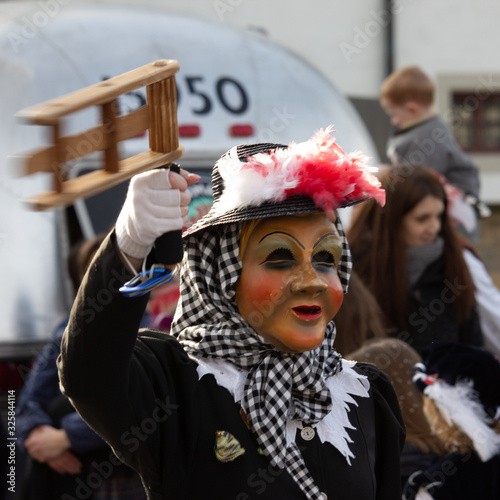 Closeup Portrait of a masked person on a carnival parade