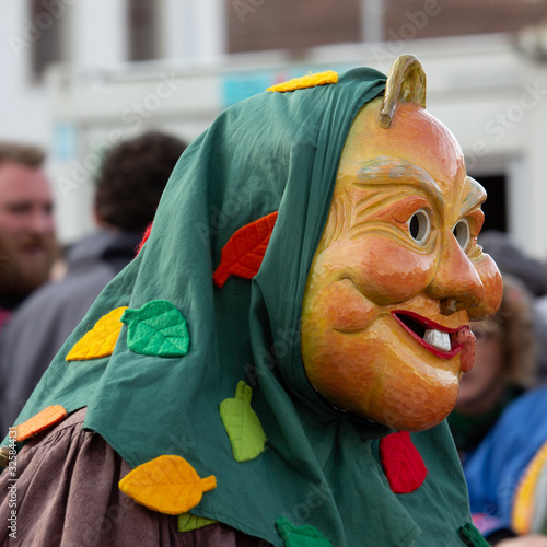 Closeup Portrait of a masked person on a carnival parade