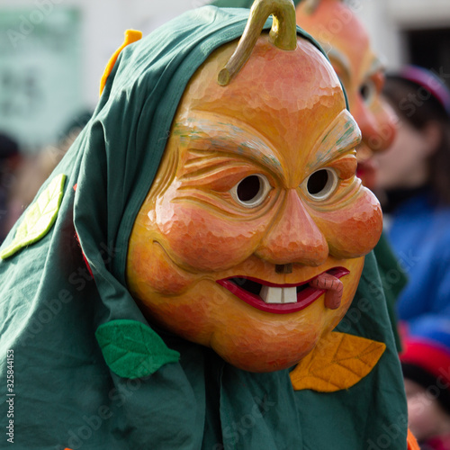 Closeup Portrait of a masked person on a carnival parade