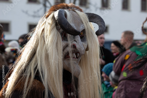 Closeup Portrait of a masked person on a carnival parade