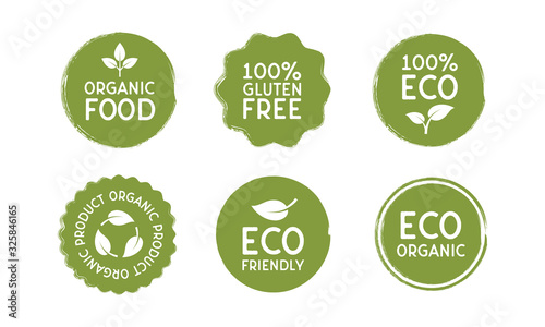 Stickers for Organic and Eco friendly products in minimal vintage design. Vector Eco badges in circle shape with leaves icons isolated on white background.