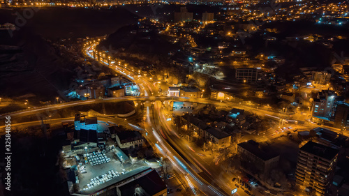 Canvas Print Night city drone long exposure shooting